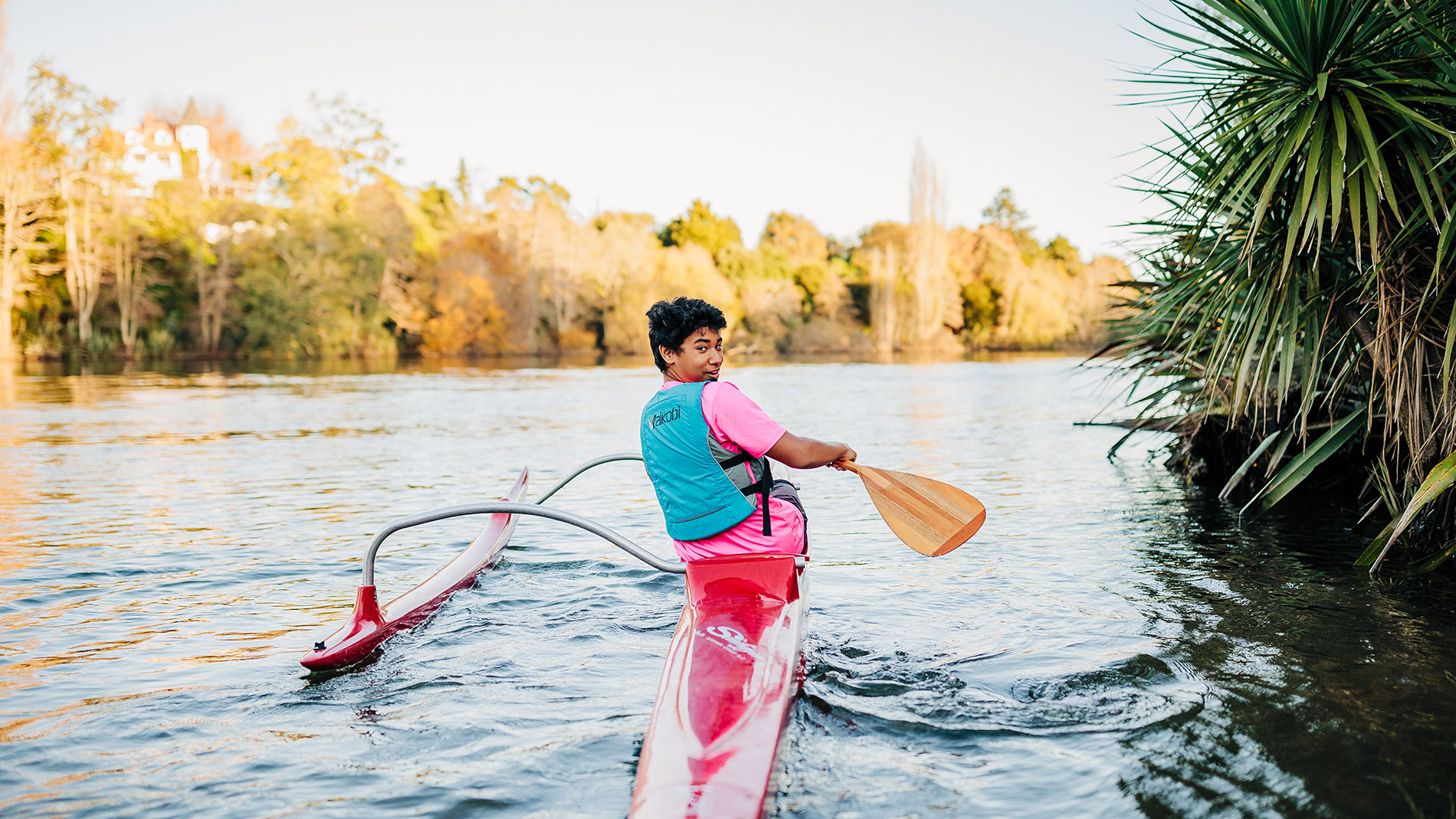 Image of waka ama on Waikato River